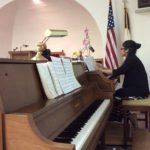 ...and playing the organ as well